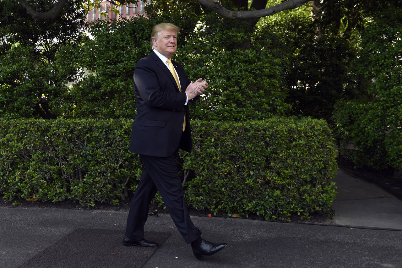 President Donald Trump har grunn til å være fornøyd med veksten i første kvartal, som er kraftigere enn hva analytikerne ventet. Foto: Susan Walsh / AP / NTB scanpix