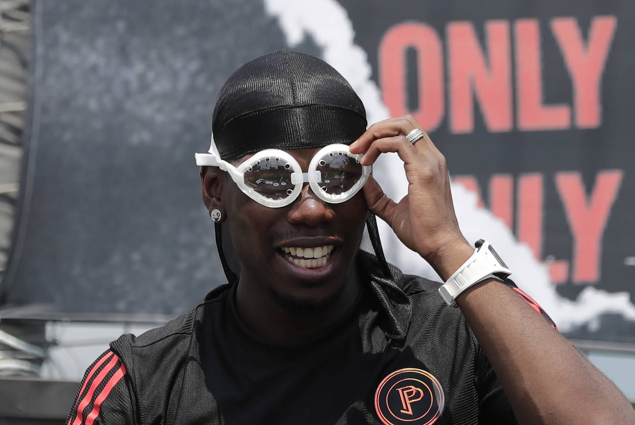 Manchester Uniteds Paul Pogba i Sør-Korea i forrige uke. Mange spør seg om han blir værende i United neste sesong eller forsvinner til Spania eller Italia. Foto: AP /Lee Jin-man / NTB scanpix