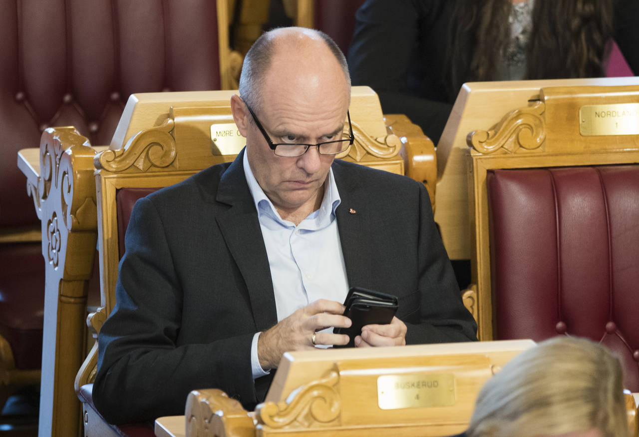 Steinar Reiten (KrF) varsler en omkamp i regjeringen om den omstridte lakseskatten. Foto: Terje Pedersen / NTB scanpix