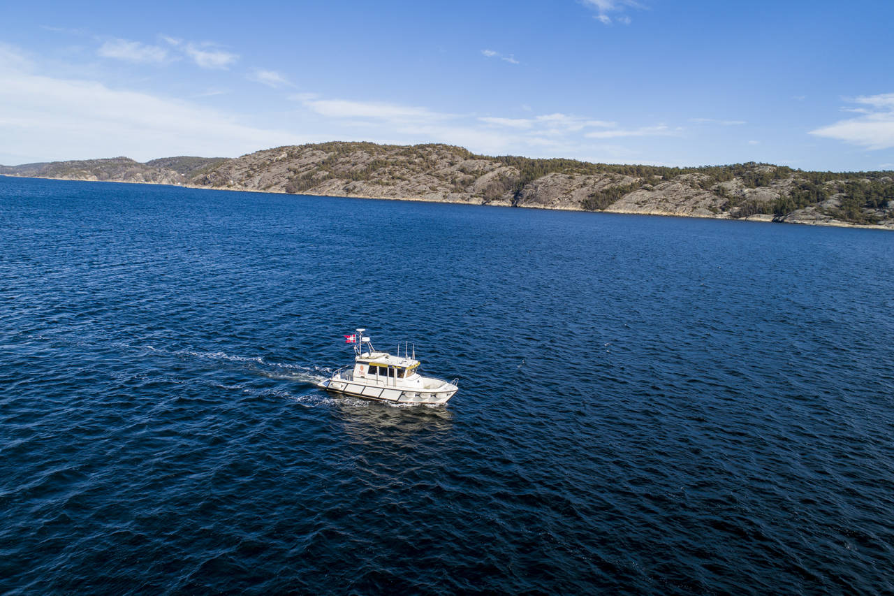 Uten tur og hytte, duger den norske kroppen ikke. Båteiere jubler nå for at de kan dra ut på sjøen i påsken. Foto: Tore Meek / NTB scanpix