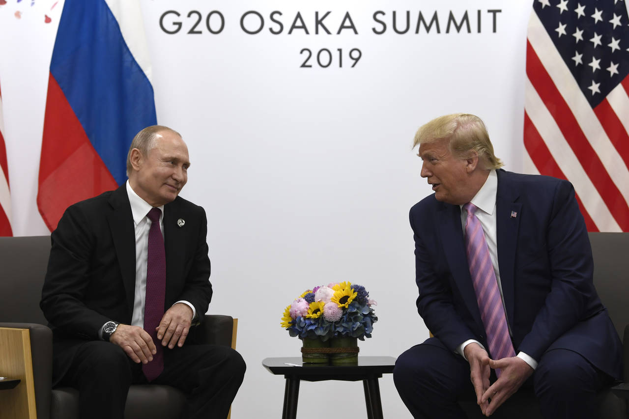 President Donald Trump (til høyre) møtte Russlands president Vladimir Putin i fjor. Arkivfoto: Susan Walsh / AP / NTB scanpix