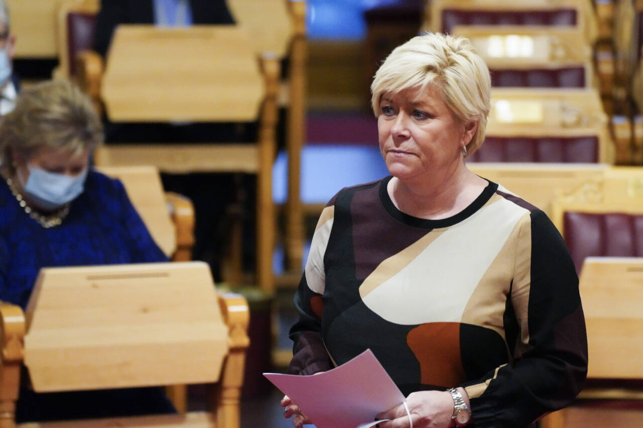 Fremskrittspartiets leder Siv Jensen fikk i budsjettforhandlingene med regjeringspartiene gjennomslag for å stramme inn asyl- og innvandringspolitikken på to områder. Foto: Ole Berg-Rusten / NTB