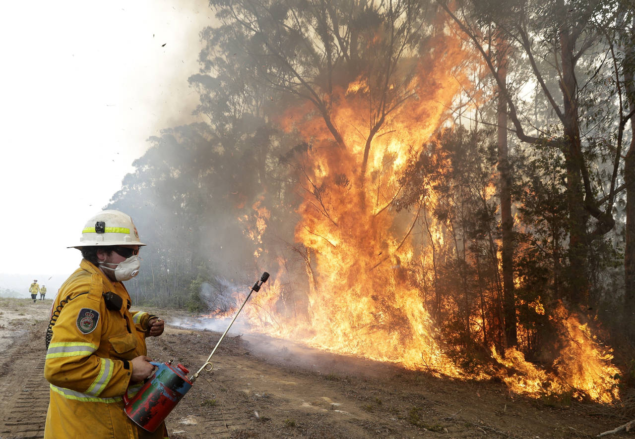 Utvidet farevarsel i Australia. Foto: Rick Rycroft / AP / NTB scanpix