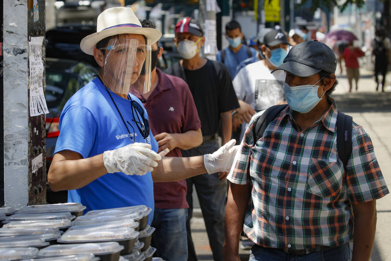 Nabolaget Corona i Queens er ett av de hardest rammede i korona-pandemien i USA. Queens har registrert 5.940 dødsfall. Foto: AP Photo/John Minchillo/NTB scanpix