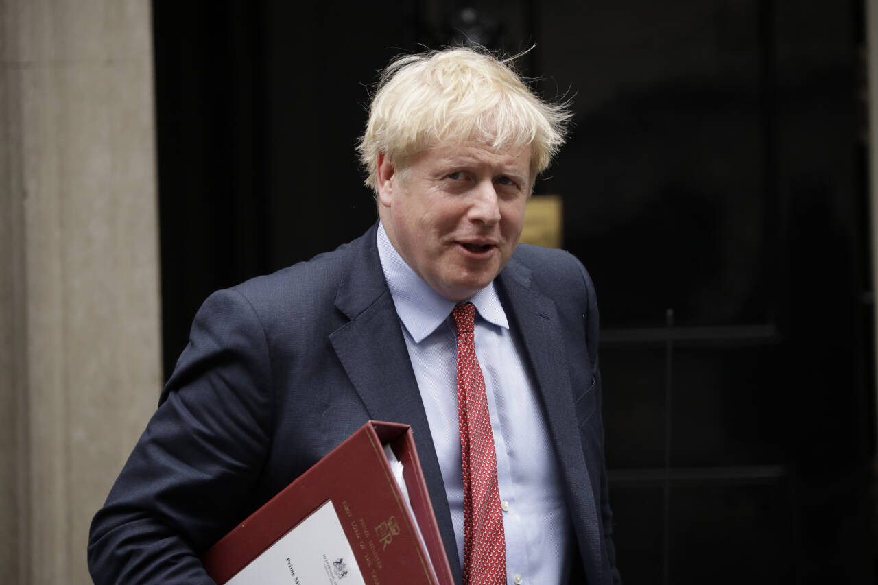 Den britiske regjeringen, her ved statsminister Boris Johnson, fjerner karantenekrav for 58 land, blant dem Norge. Foto: Matt Dunham / AP / NTB scanpix