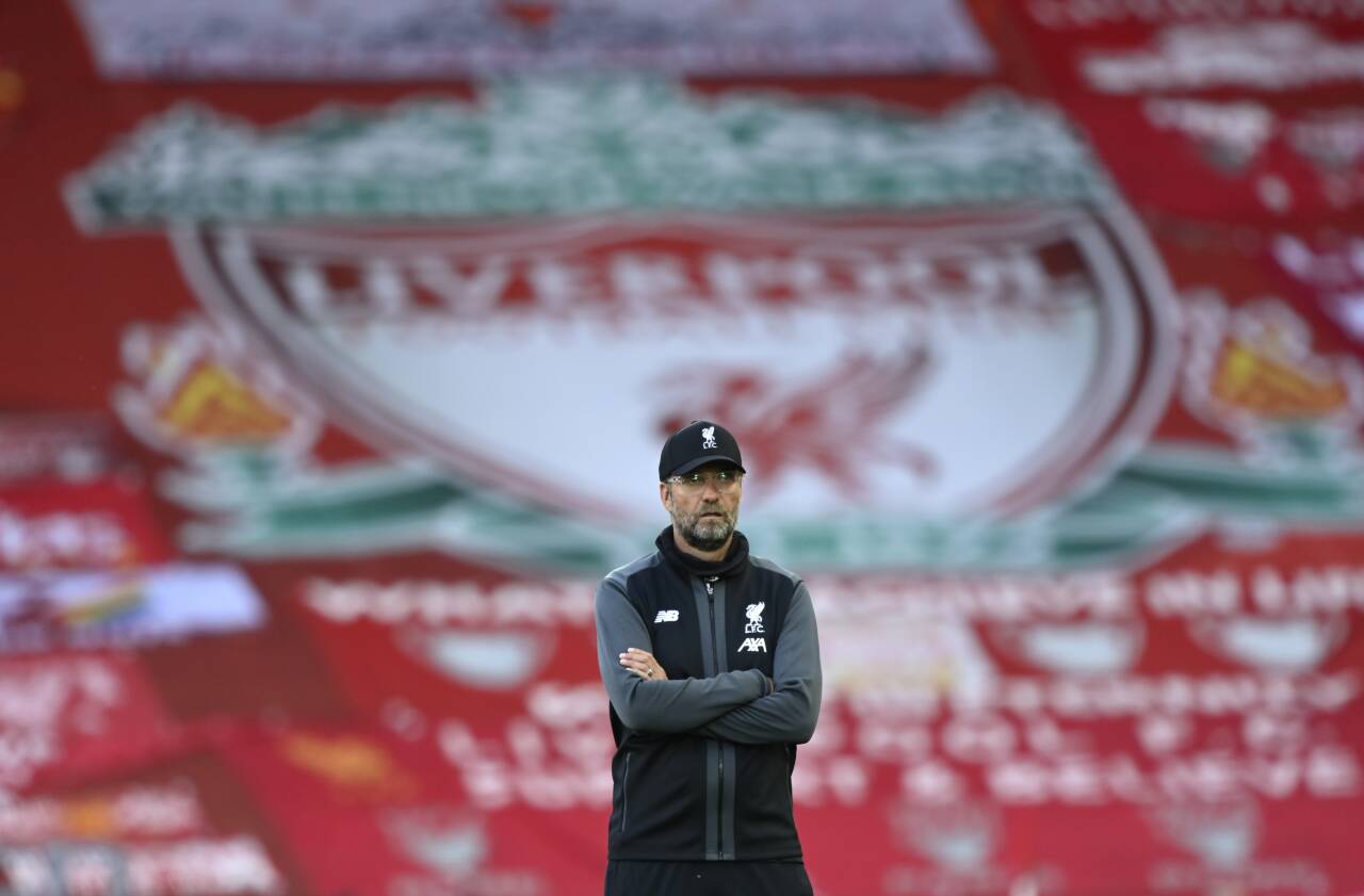 Liverpools supportere får ikke overvære løftingen av klubbens første ligatrofé på 30 år. Foto: Shaun Botterill / AP / NTB scanpix