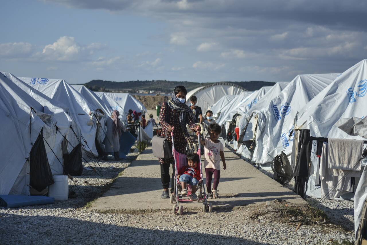 Titusener av asylsøkere befinner seg fortsatt i ulike flyktningleirer i Hellas.Foto: AP / Panagiotis Balaskas / NTB