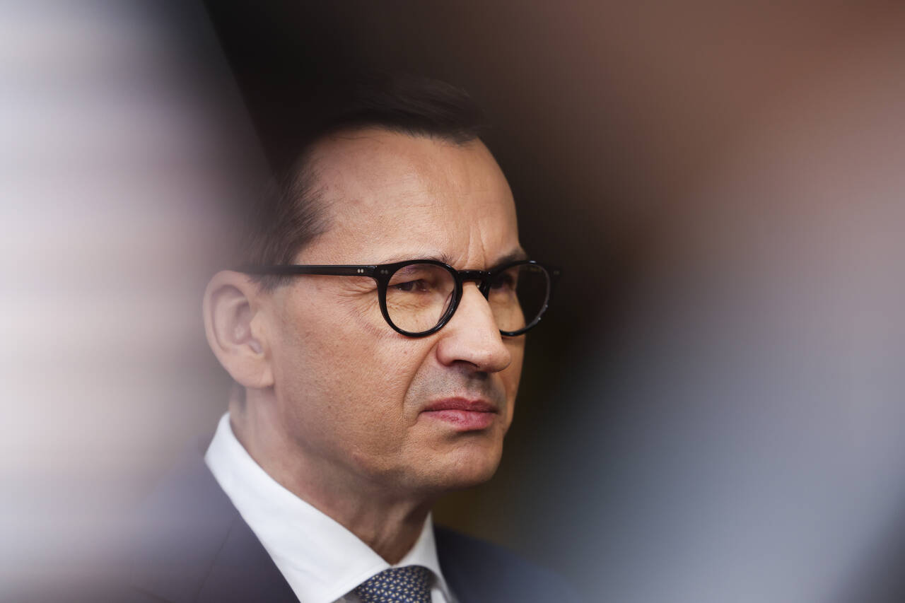 Polens statsminister Mateusz Morawiecki vil holde folkeavstemning og spørre polakkene om de vil ha åpne Polen for tusener av ulovlige innvandrere fra Midtøsten og Afrika. Foto: Geert Vanden Wijngaert / AP / NTB