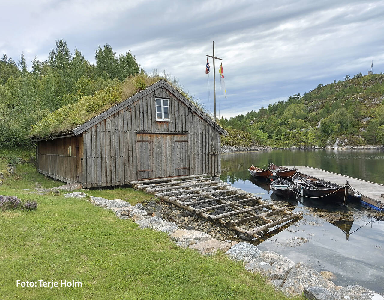 Naust med historiske båter ved Kråksundet Sjøbruksmuseum. Foto: Terje Holm