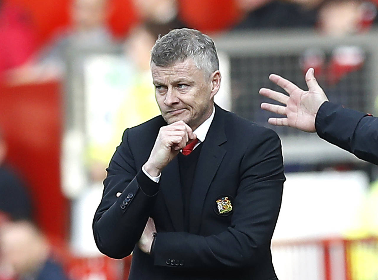 Manchester United-manager Ole Gunnar Solskjær skal studere Barcelona fra tribuneplass lørdag kveld. Foto: Martin Rickett / PA / AP / NTB scanpix